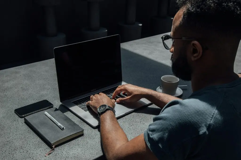 Person using a laptop to read a newsletter email